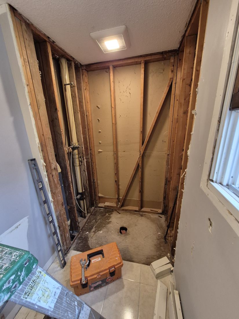 Shower area in Danvers, MA stripped to the wall studs before rebuild